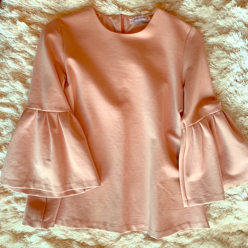 Rose colored bell sleeve top